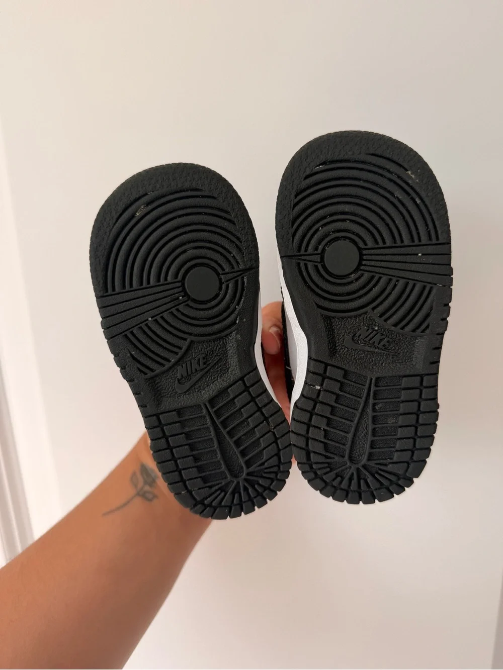 Nike Kids Black and White Low-Top Sneaker with Swoosh